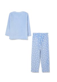 Ensemble de pyjama en polaire bleu clair. Le haut a des manches longues ; le bas possède une taille élastique et des pois blancs sur un fond bleu clair.
