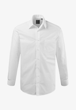 Chemise blanche à manches longues avec boutons, en tissu lisse. Elle présente un col, une poche avant et un ourlet incurvé avec une fermeture à boutons.