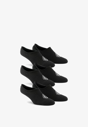 Trois paires de chaussettes basses noires avec un logo triangulaire blanc sur le dessus, disposées en formation décalée sur un fond blanc.