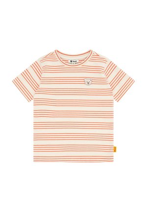 Camiseta a rayas en color crema con líneas horizontales naranjas, que presenta un parche de oso en el pecho y una pequeña etiqueta amarilla en el dobladillo.