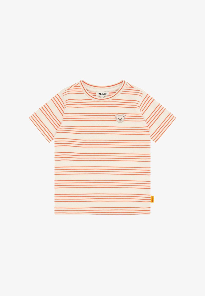 Camiseta a rayas en color crema con líneas horizontales naranjas, que presenta un parche de oso en el pecho y una pequeña etiqueta amarilla en el dobladillo.