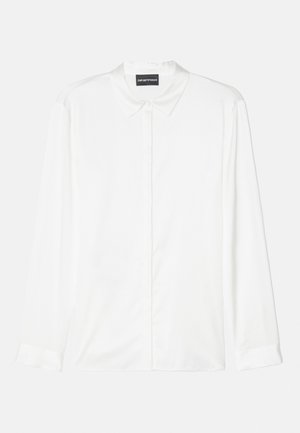 Hvid skjorte med lange ærmer lavet af glat stof, med klassisk krave, knaplukning foran og enkle manchetter med et rent, minimalistisk design.