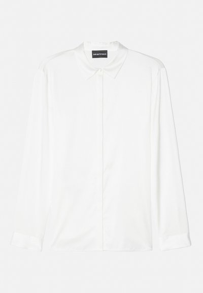 Hvid skjorte med lange ærmer lavet af glat stof, med klassisk krave, knaplukning foran og enkle manchetter med et rent, minimalistisk design.