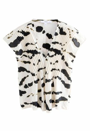 Blusa a maniche corte color crema con un motivo astratto nero. Presenta un profondo scollo a V e pieghe sulla parte anteriore, realizzata in tessuto leggero.