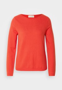 Pull rouge à manches longues avec un col rond. Confectionné dans un tissu lisse et doux. Présente une couleur unie sans motifs ni ornements.