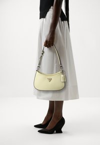 Guess - NOELLE TOP ZIP SHOULDER BAG - Handbag - pale yellow Thumbnail Image 1
