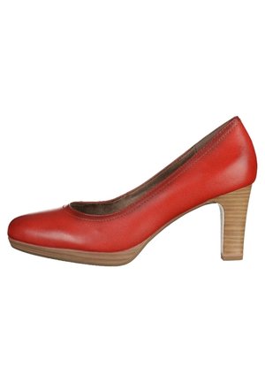 Escarpin pour femmes en cuir rouge avec bout arrondi et talon en bois empilé de hauteur moyenne, présenté de profil sur fond blanc.