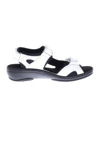 White synthetic sandal with adjustable straps, open design for breathability, black sole, cushioned footbed, and stitching details.