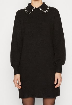 Stickad klänning - black