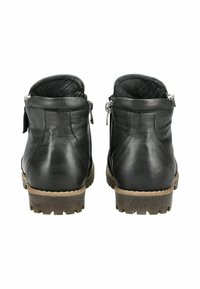 Bottines en cuir noir avec une finition texturée, dotées d'une semelle en caoutchouc à profil bas et d'accents en zipper argenté. Vue arrière montrant les détails de couture.