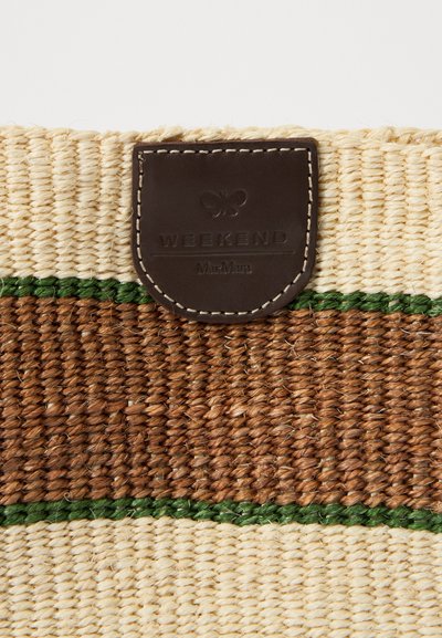 Woven straw bag with beige, brown, and green stripes; features a brown leather tag embossed with "WEEKEND" and butterfly design.