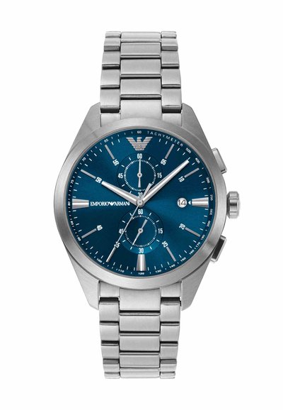 Silberne Chronograph-Uhr aus Edelstahl mit blauem Zifferblatt, Tachymeterskala, Datumsanzeige bei 3 Uhr und Gliederarmband.