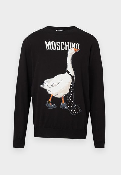 Fekete pulóver, mely libát ábrázol, amely pöttyös nyakkendőt és cipőt visel. Puha anyagból készült, bordázott nyakkivágással és szegéllyel.