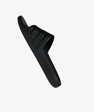 Black slide sandal made of textured rubber, featuring three raised straps and a contoured footbed for comfort. Sleek and minimal design.