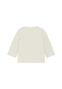 Lichtbeige langslavige shirt met een ronde halslijn. Zacht, glad katoenmateriaal. Eenvoudig ontwerp, geen zichtbare patronen of accenten.