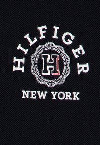 Tommy Hilfiger MONOTYPE - Polo shirt - desert sky