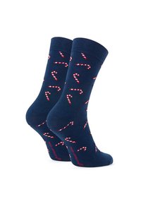 Niebieskie skarpetki bawełniane z powtarzającym się wzorem w paski cukrowej w kolorze czerwonym i białym. Wygodny krój z ściągaczami na górze.