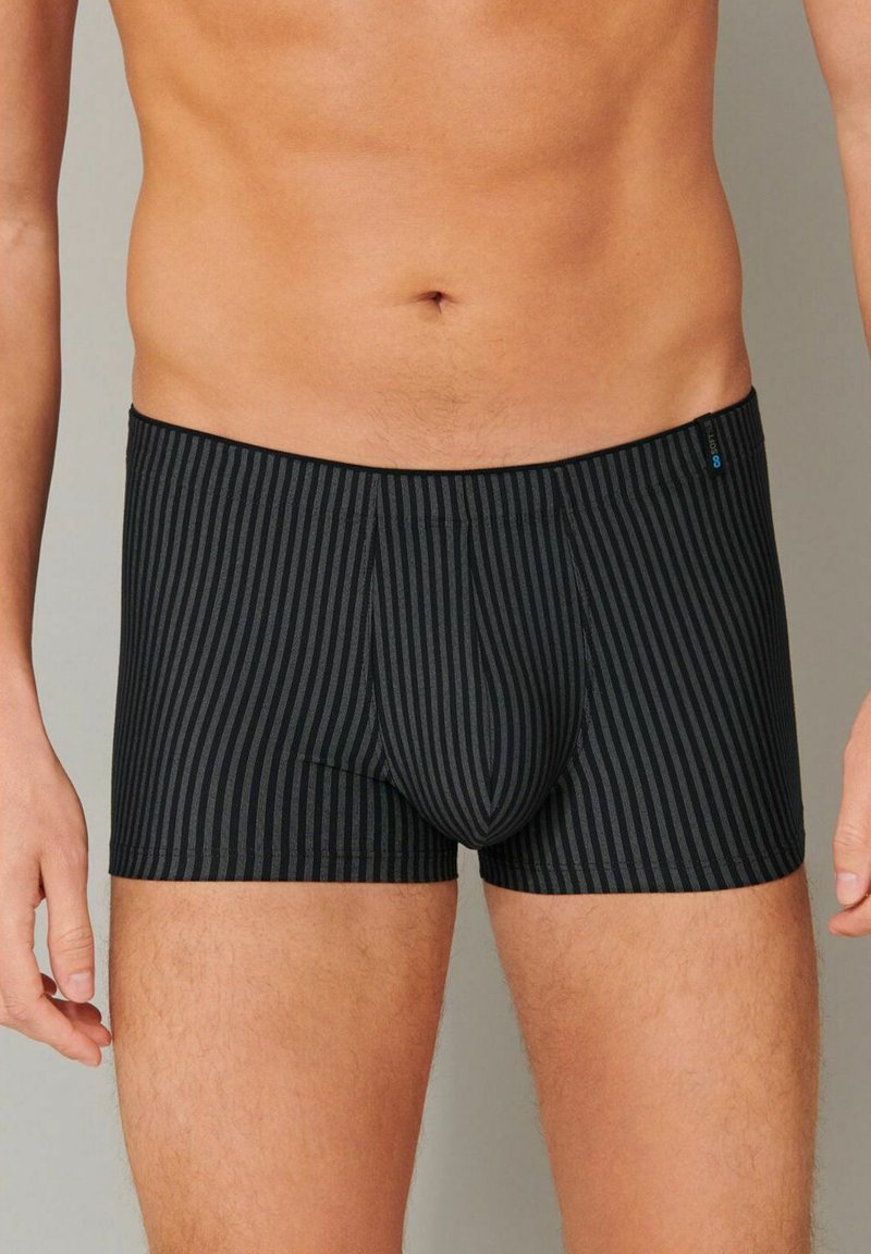 Black striped boxer briefs featuring a snug fit and elastic waistband, made from a soft textile with a smooth texture.