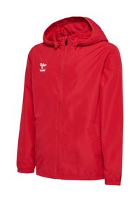 Red waterproof jacket with a zip closure, adjustable hood, elastic cuffs, and logo detail. Made of smooth, lightweight fabric.