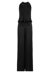 Svart jumpsuit med halterneck och knytning bak. Vid ben-design i mjukt tyg som erbjuder en flowy silhuett.