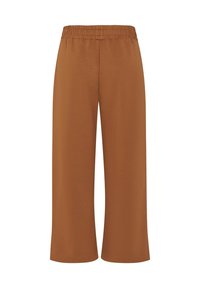 Braune weit geschnittene Hose mit elastischem Bund; aus leichtem Stoff; glatte Textur ohne sichtbare Muster oder Akzente.