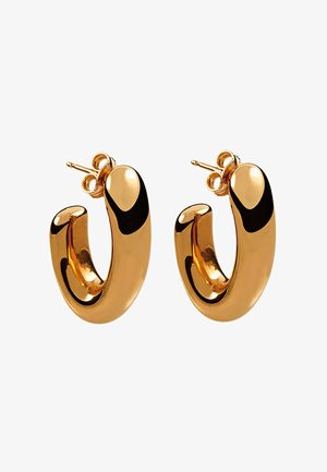 Pendientes de aro en tono dorado, con un diseño suave y redondeado de acabado brillante. Cierre sencillo con soporte posterior.
