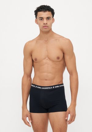 Schwarze Boxerbriefs mit enger Passform und elastischem Bund, der das "Karl Lagerfeld"-Logo in Weiß zeigt. Glatte Stoffstruktur.