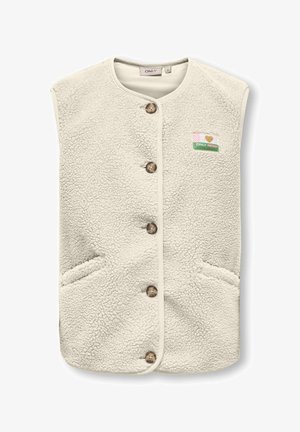 Veste sans manches en polaire couleur crème avec col rond, cinq boutons marron, deux poches avant et un petit écusson multicolore sur la poitrine.