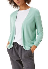 Ljus mintgrön cardigan i mjukt stickat material, med avslappnad passform, öppen framsida, långa ärmar och ribbade manschetter.