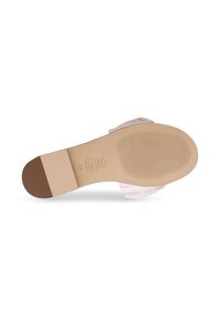 Helle rosa Schuhe mit einem glatten Stoffoberteil und einer flachen Sohle. Die Unterseite hat ein Gummi-Profil für besseren Halt und einen kleinen braunen Akzent an der Ferse.