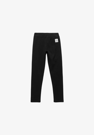 Zwarte leggings van rekbare katoen met een zachte textuur, voorzien van een elastische tailleband en een klein merklogo label aan de voorkant.