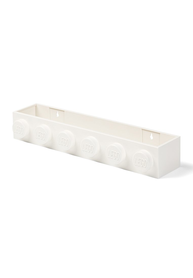 Almacenamiento de pared de LEGO en color blanco, forma rectangular con cinco perillas redondas que presentan el logo "LEGO" en relieve. Superficie lisa, diseñado para la organización.