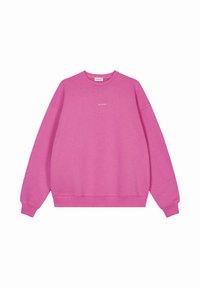 Felpa rosa con scollo rotondo, maniche lunghe e polsini a coste. Presenta un piccolo logo bianco al centro davanti. Materiale morbido.