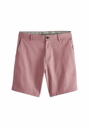 Pantalones cortos de algodón rosa con frente plano, dos bolsillos laterales y cierre de botón. Presenta un forro de cinturilla con patrón en contraste.