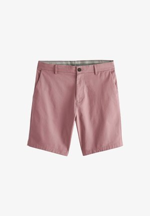 Lyserøde bomuldsshorts med flad front, to sidelommer og knaplukning. Har en kontrastfarvet mønstret livlinning.