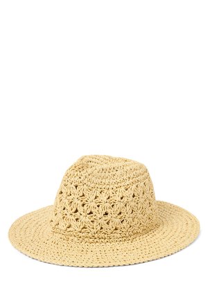 Beige brede strohoed met een gehaakt bloemmotief op de kroon, geschikt voor zonbescherming.