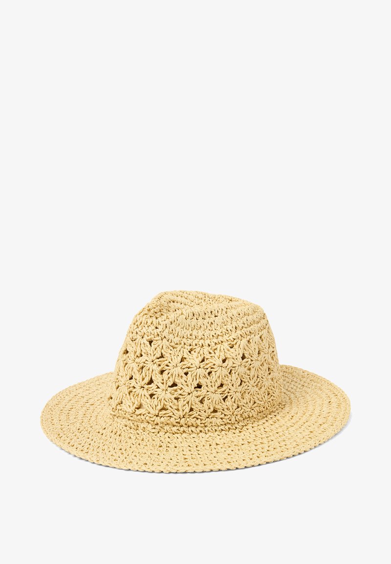 Chapeau en paille beige à large bord tissé avec un motif floral en crochet sur la calotte, adapté à la protection solaire.