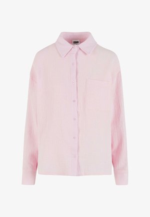 Light pink button-up shirt with a textured, crinkled fabric, collared neckline, long sleeves, and a single chest pocket.