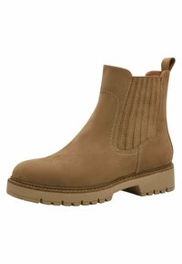 Bottines en daim beige avec des détails de coutures verticales, une semelle texturée et une languette à l'arrière pour un enfilage facile. Design à bout rond.
