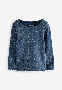 Langarmoberteil in Marineblau aus geripptem Stoff, verziert mit verstreuten weißen Punkten und einem gewellten Saum. Markenlabel: NEXT.