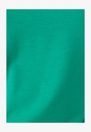 Stevig turkoois stof met een gladde textuur, met lichte plooien en een fijn breipatroon.