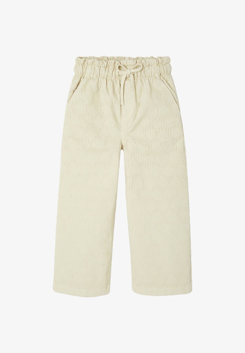 Cream-colored pants with an elastic waistband, drawstring, and side pockets. The fabric features a subtle textured pattern throughout.