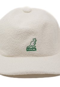 White fleece cap with a rounded crown and flat brim. Features a textured surface and a green embroidered Kangol logo.