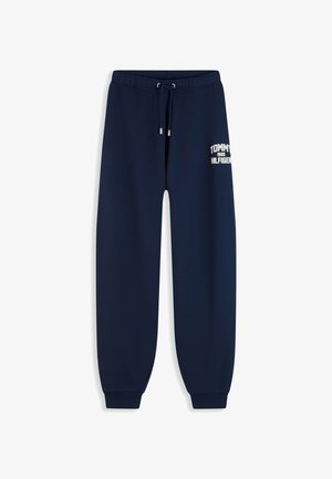 Tommy Hilfiger, FLOCK VARSITY LOGO CUFFED JOGGERS - Долнище на анцуг - dark blue
