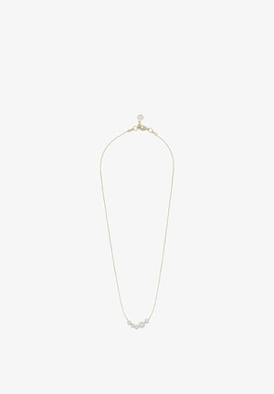 Delicate gold chain necklace with a lobster clasp and seven small white pearls arranged asymmetrically at the center.
