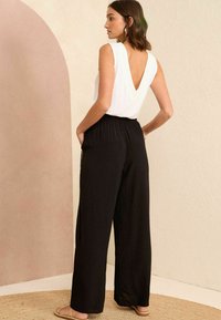 Love & Roses WIDE LEG - Hlače - black