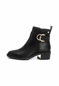 Botines camperos - black