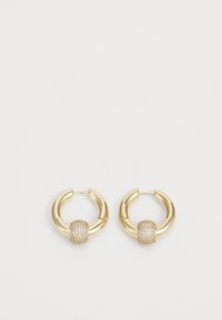 Seleccionado, gold-coloured