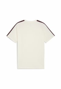 Tricou crema cu maneci scurte, având dungi patternate de culoare roșie închisă pe umeri și un design clasic cu guler rotund, realizat dintr-un material neted.