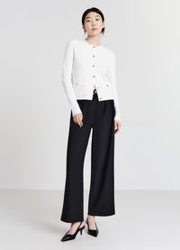 Calliope Strickjacke - bianco lana